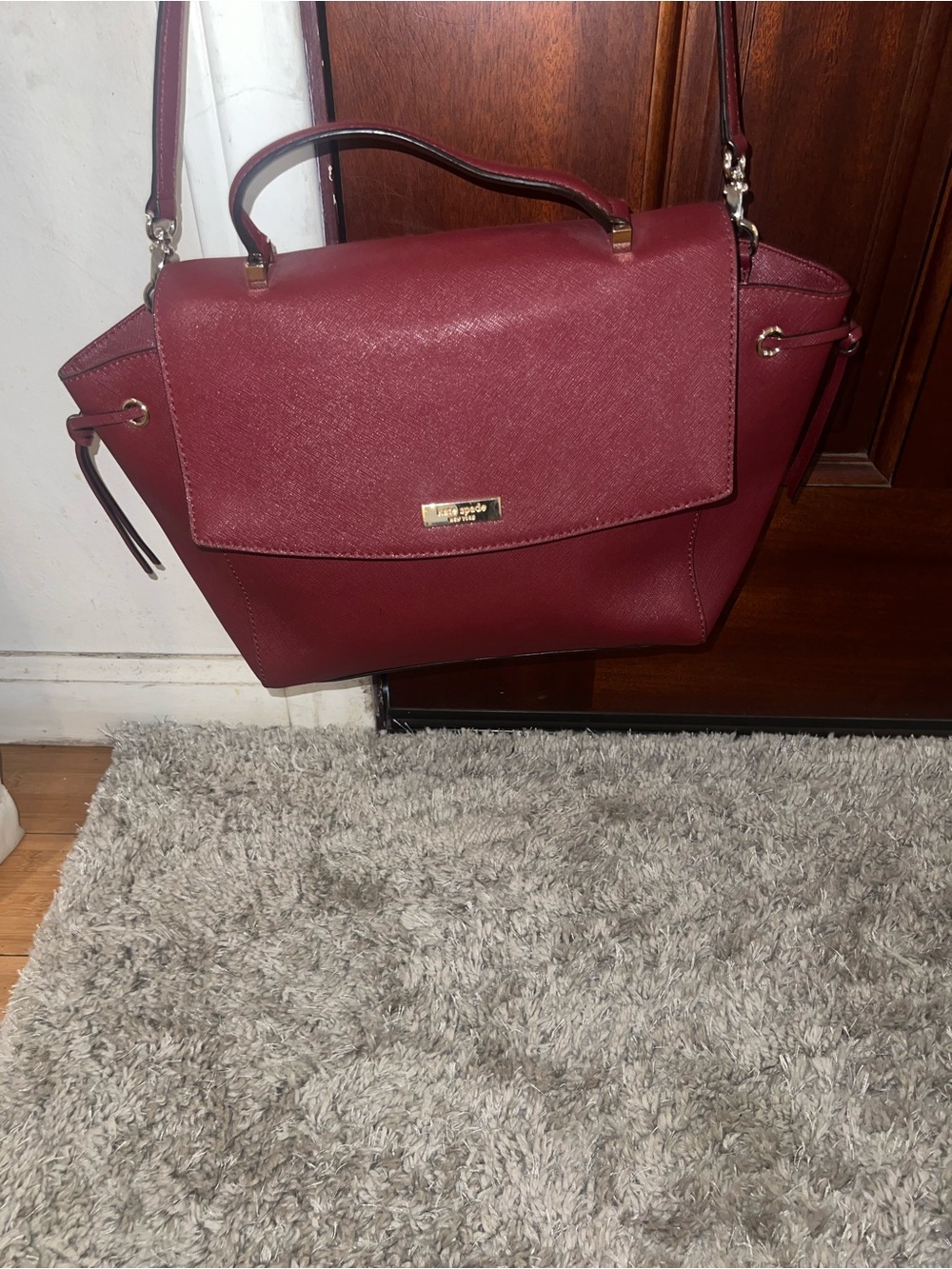 kate spade burgundy satchel with gold accents